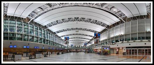 Panorama of a modern airport check-in hall at Buenos Aires-Ezeiza International Airport